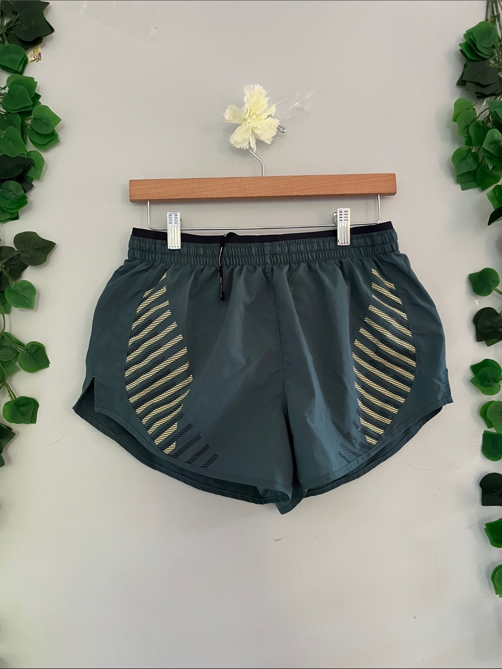 Nike Women’s Athletic Shorts in Dark Teal with Yellow Stripe Accents